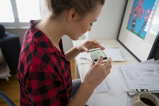 Girl making mobile check deposit